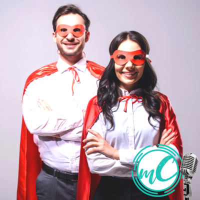 man and woman in superhero capes